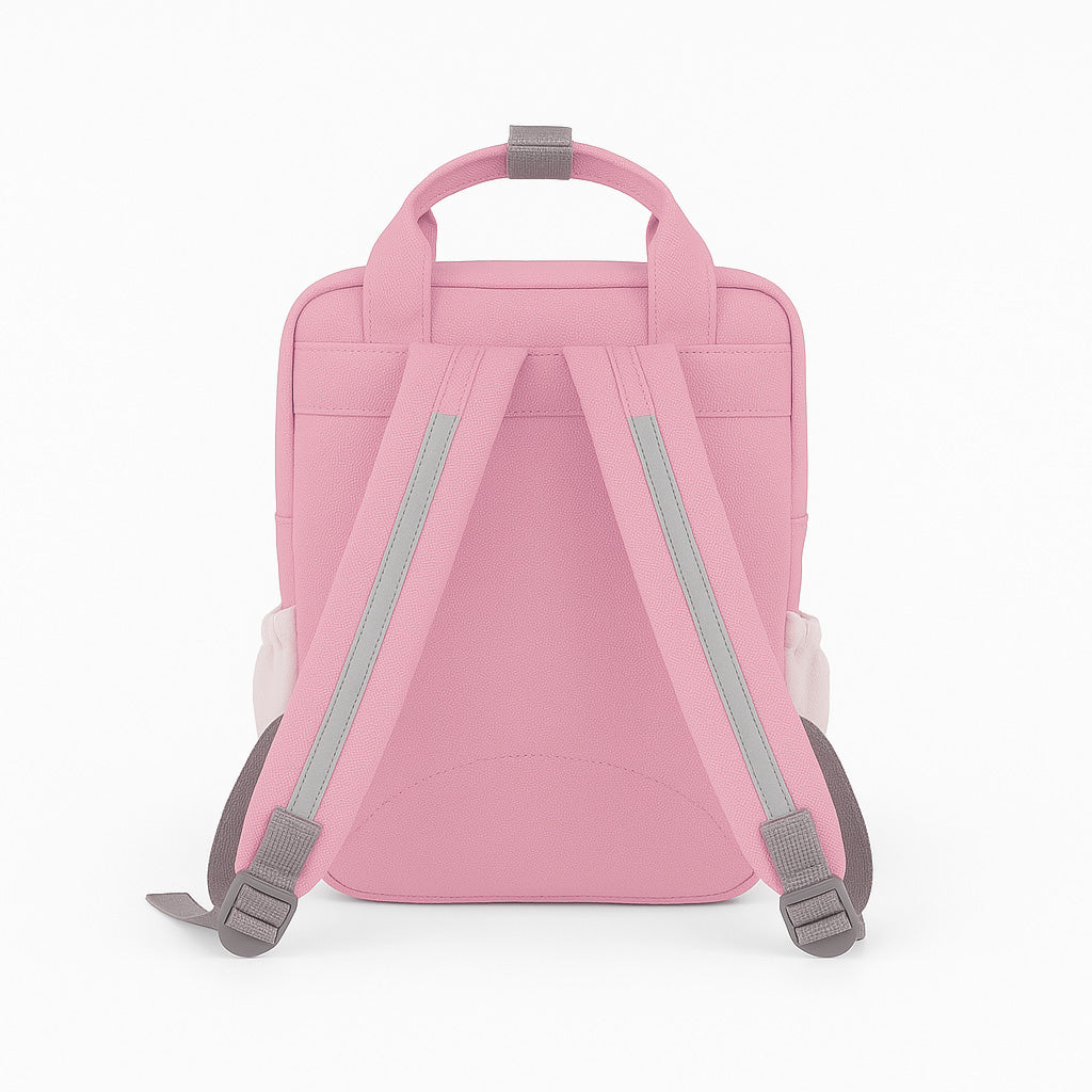 Rückseite des rosa Kindergartenrucksacks Happy Style mit gepolsterten, verstellbaren Trägern und Reflexstreifen